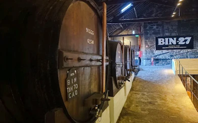 Wine barrels in a cellar at Caves do Vinho do Porto, Porto.