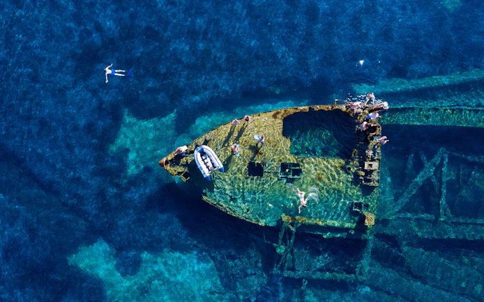 Swimming over the old wreck Michelle in the Adriatic Sea, Croatia.