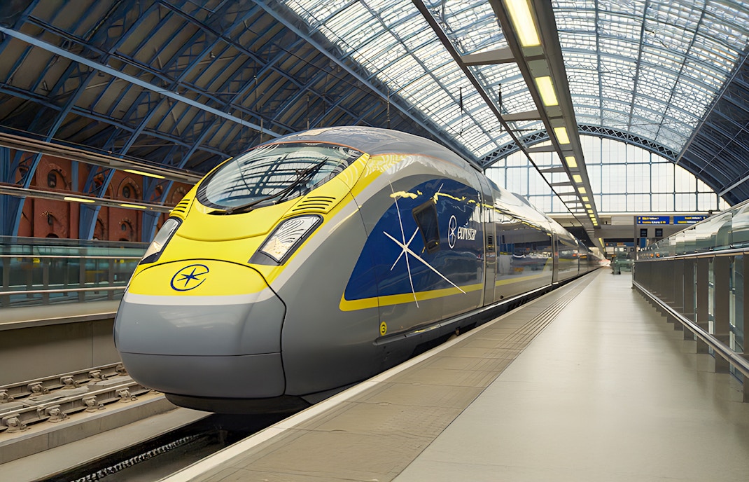 Eurostar train at platform in London station ready for departure.