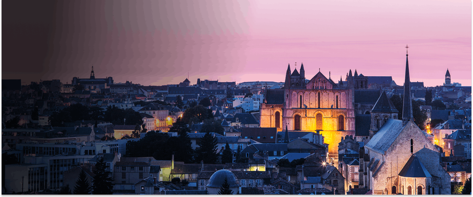 Cathedral of Saint-Pierre illuminated at sunset in Poitiers, France.