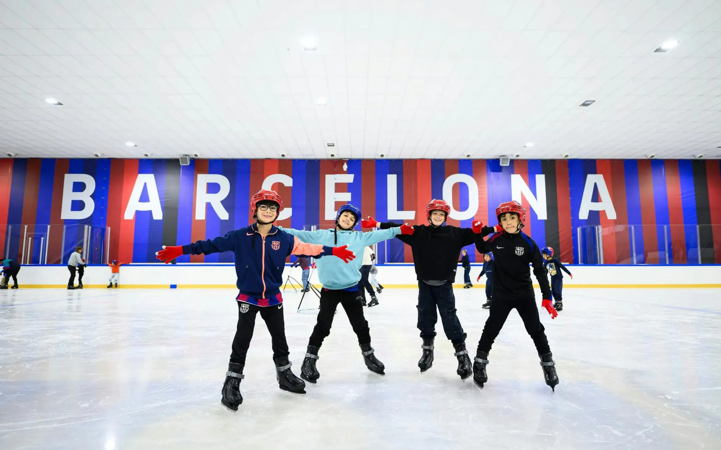 Visitors ice skating at FC Barcelona Ice Rink, Barcelona.