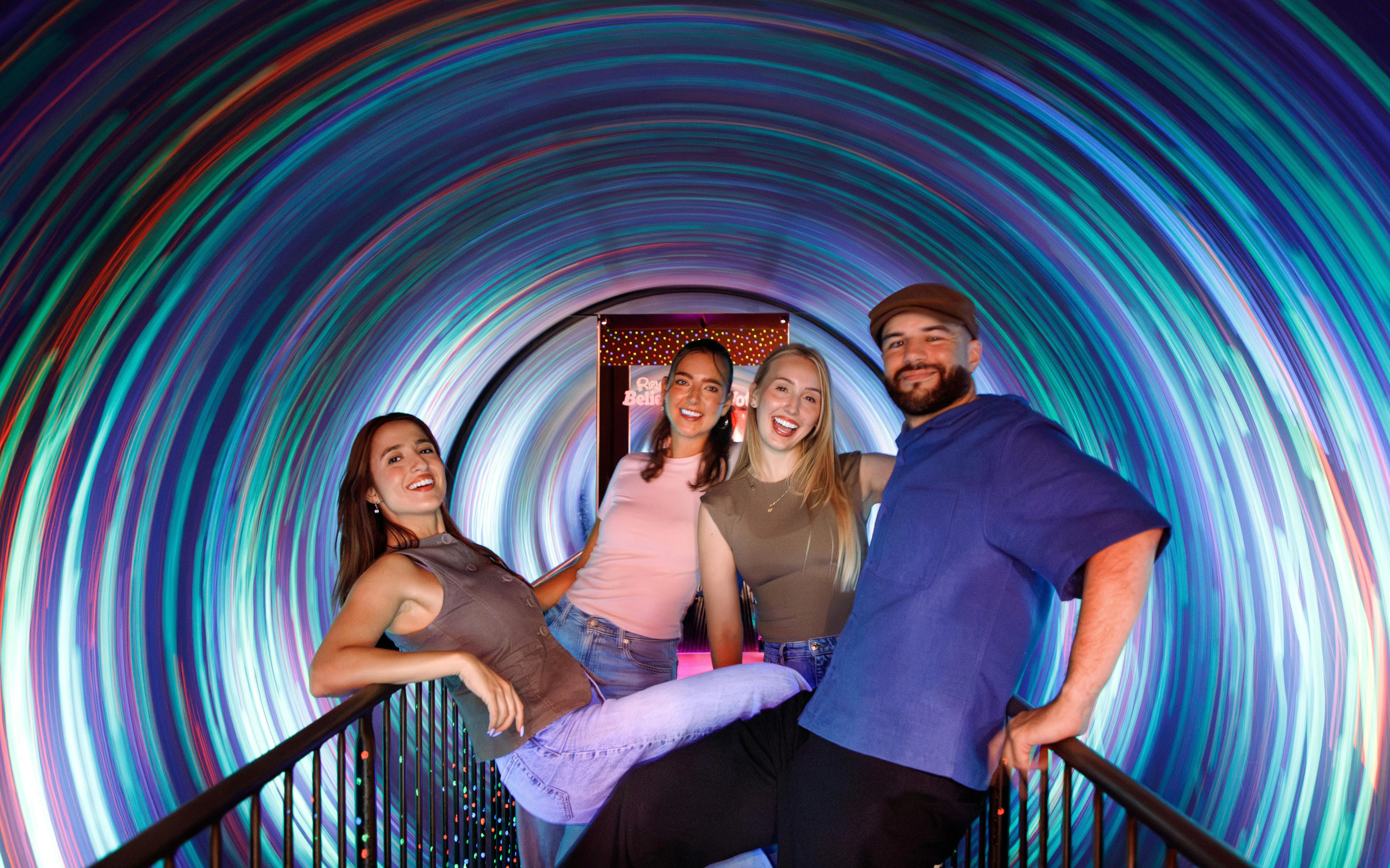 Visitors enjoying the vortex tunnel at Ripley's Believe It or Not!