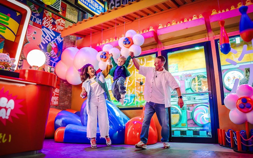 Family enjoying vibrant House of Hype attraction in Dubai.