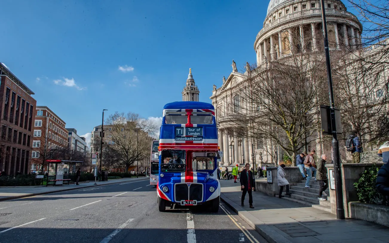 Double-decker bus near St. Paul's Cathedral, Central London, for afternoon tea tour.
