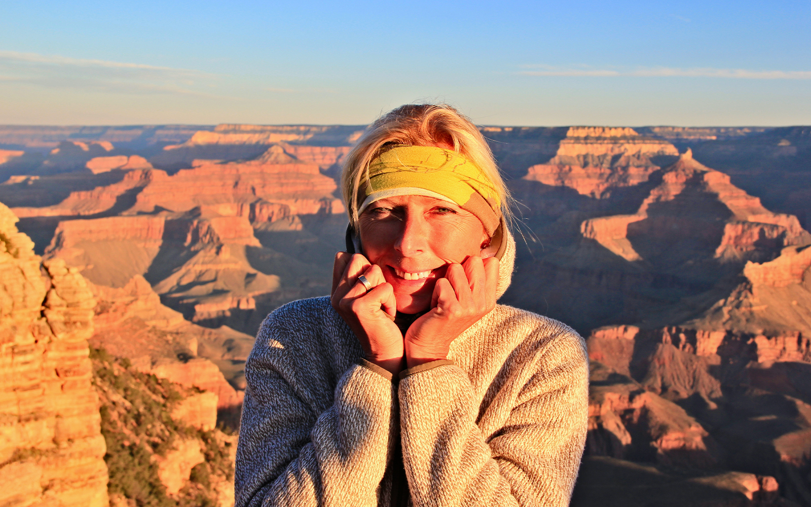 A woman wearing Layered clothing for cold weather at the Grand Canyon.