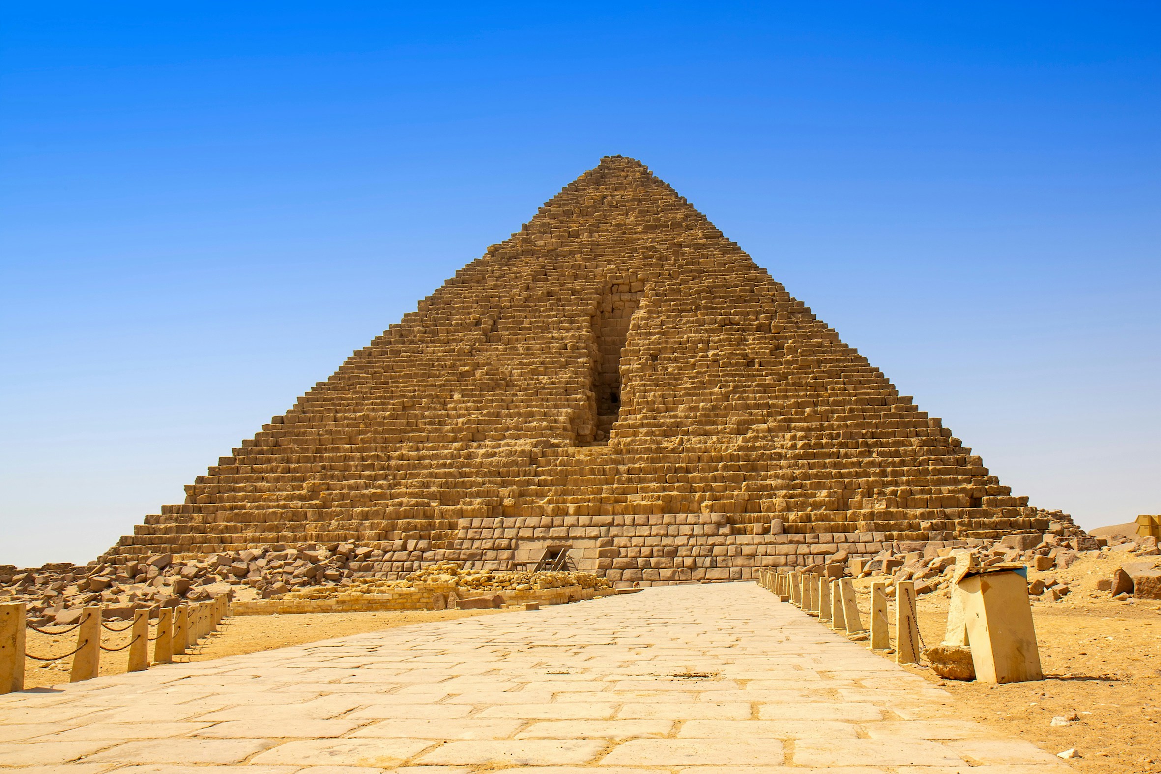 Pyramid of Menkaure exterior with stone pathway, Giza, Egypt.