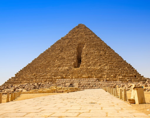 Pyramid of Menkaure exterior with stone pathway, Giza, Egypt.