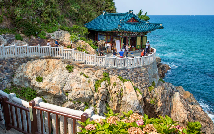 Naksansa Temple overlooking the sea on rocky cliffs near Mt. Seorak, South Korea.