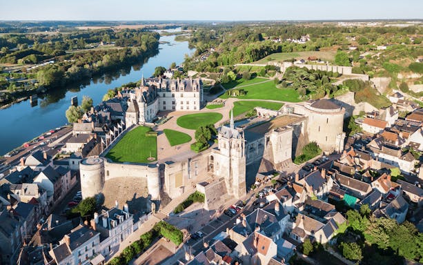 Aerial view of Royal Amboise Castle and surrounding gardens in Amboise, France.