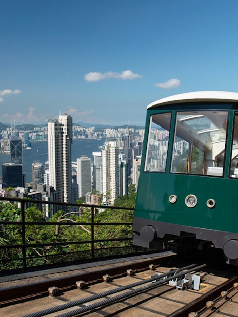 Peak Tram ascending with Hong Kong skyline view, part of Sky Pass experience.