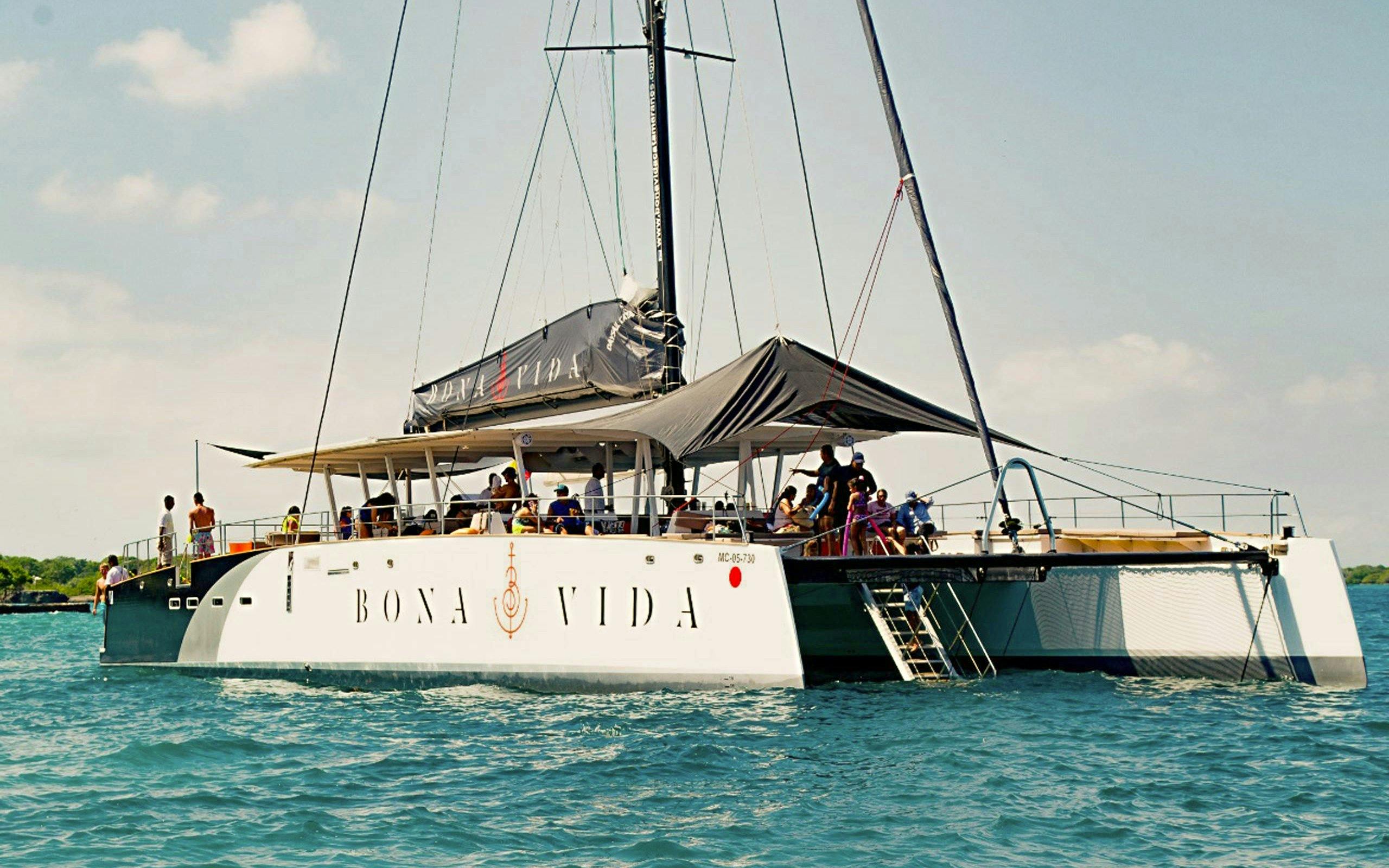 Tourists enjoying Catamaran Sunset Open Bar Tour in Cartagena.