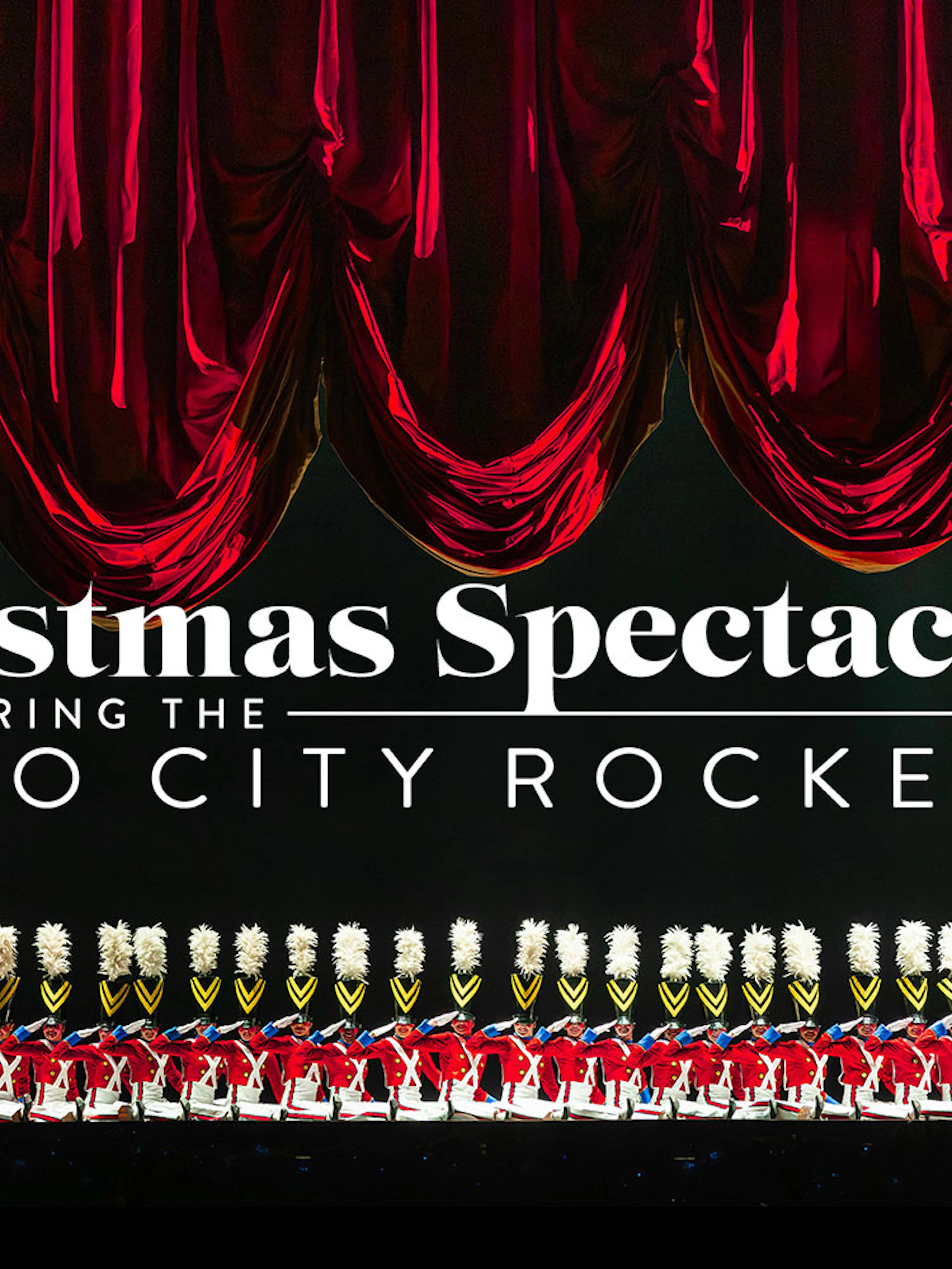 Radio City Rockettes in toy soldier costumes during Christmas Spectacular performance.