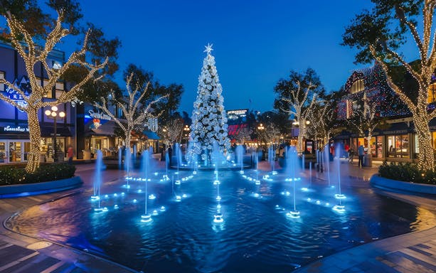 Dancing fountain and Christmas tree at The Grove Los Angeles during holiday celebration.
