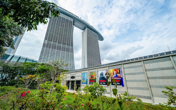 Gardens by the Bay with Marina Bay Sands in background near MBA Theatre.