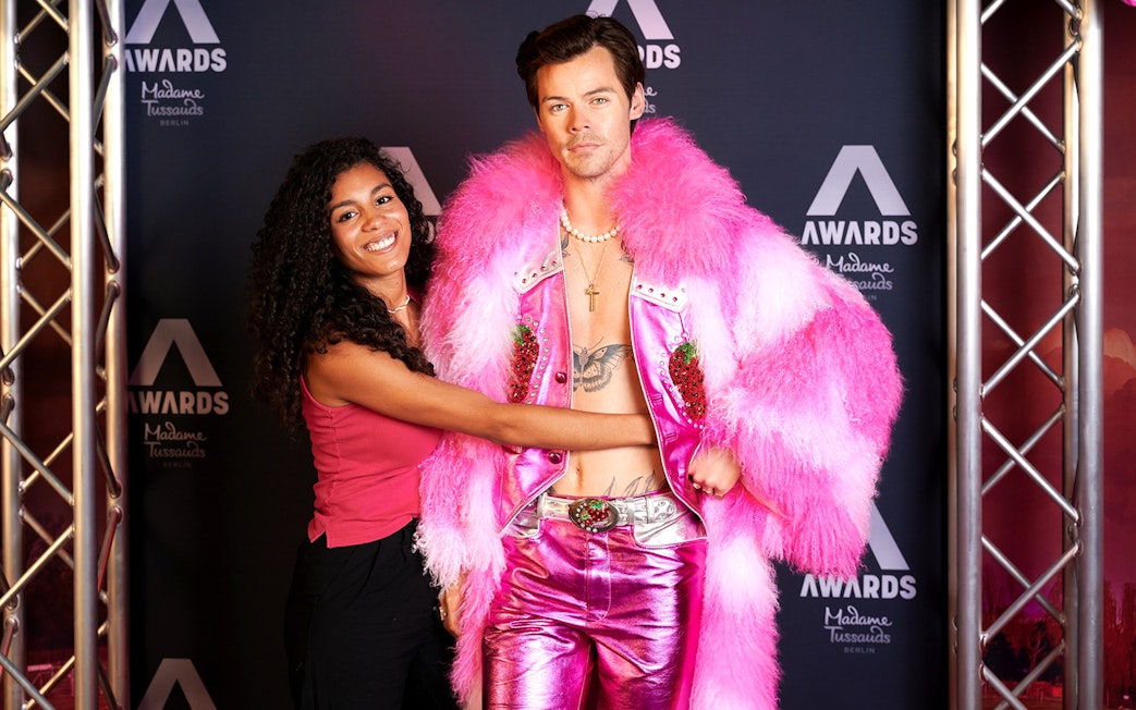 Wax figure in pink outfit at Madame Tussauds Berlin.