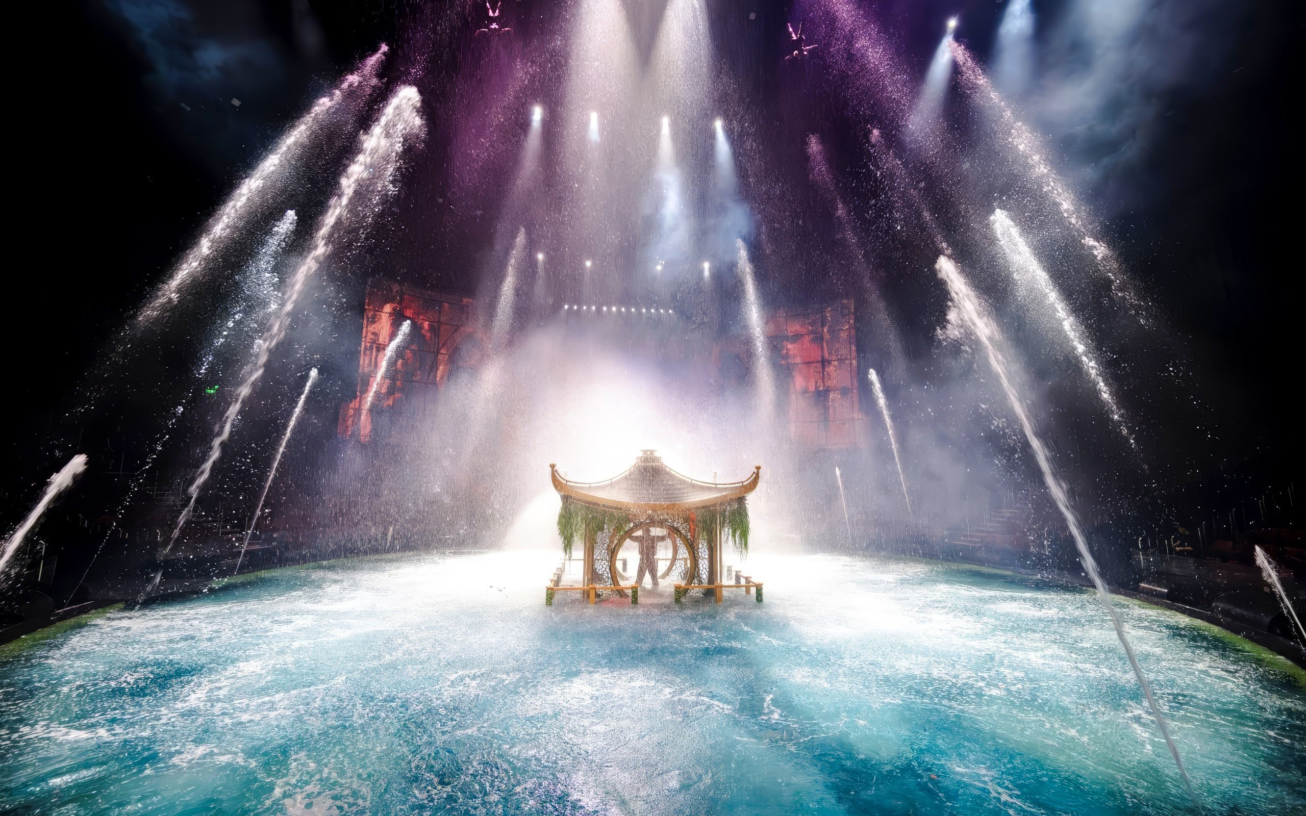 House of Dancing Water Show with illuminated fountains and traditional pavilion.