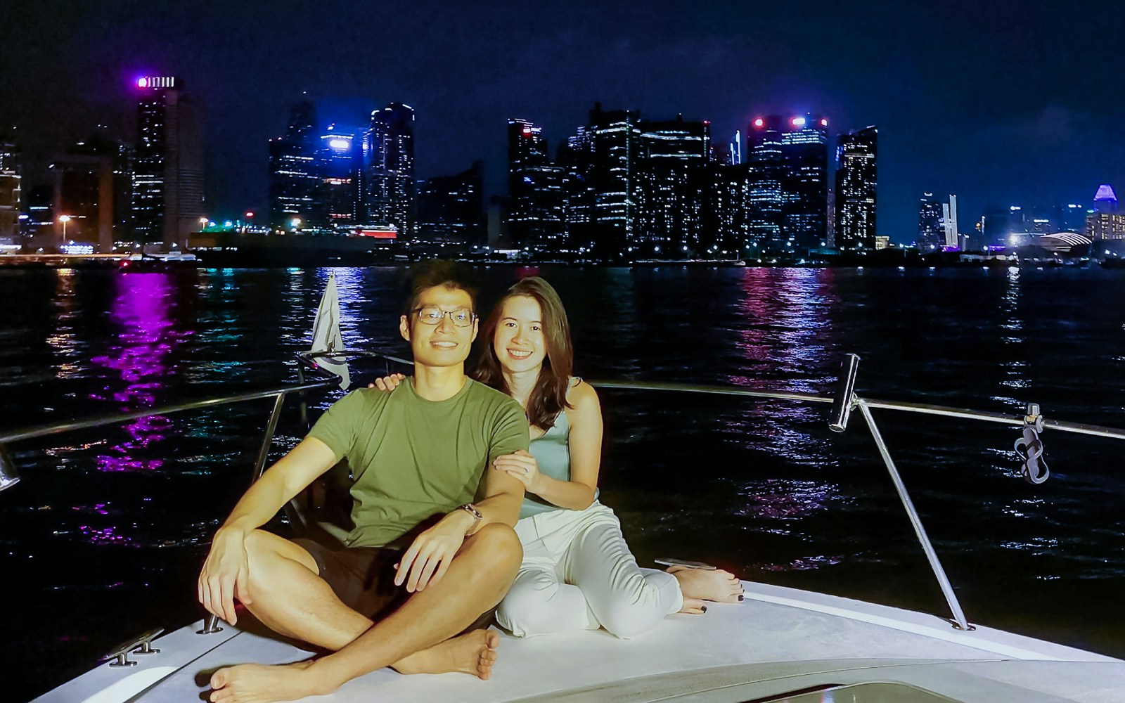 Marina Bay Sands yacht cruise with city skyline view, Singapore.