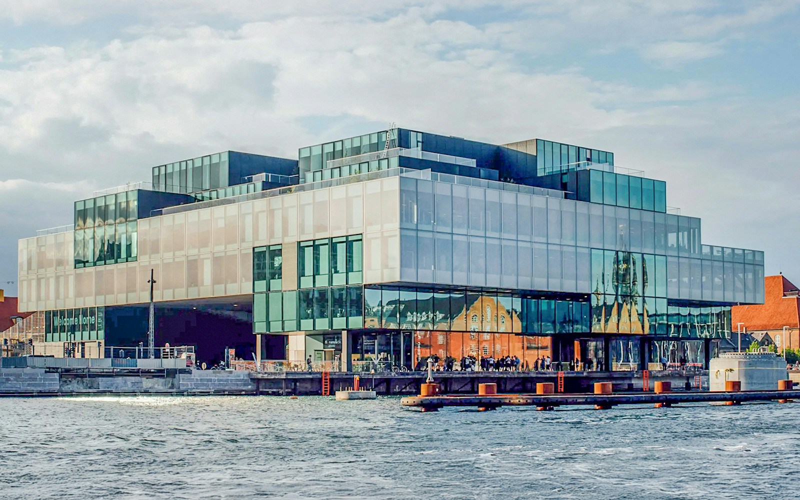The Blox building in Copenhagen with waterfront view and modern architecture.