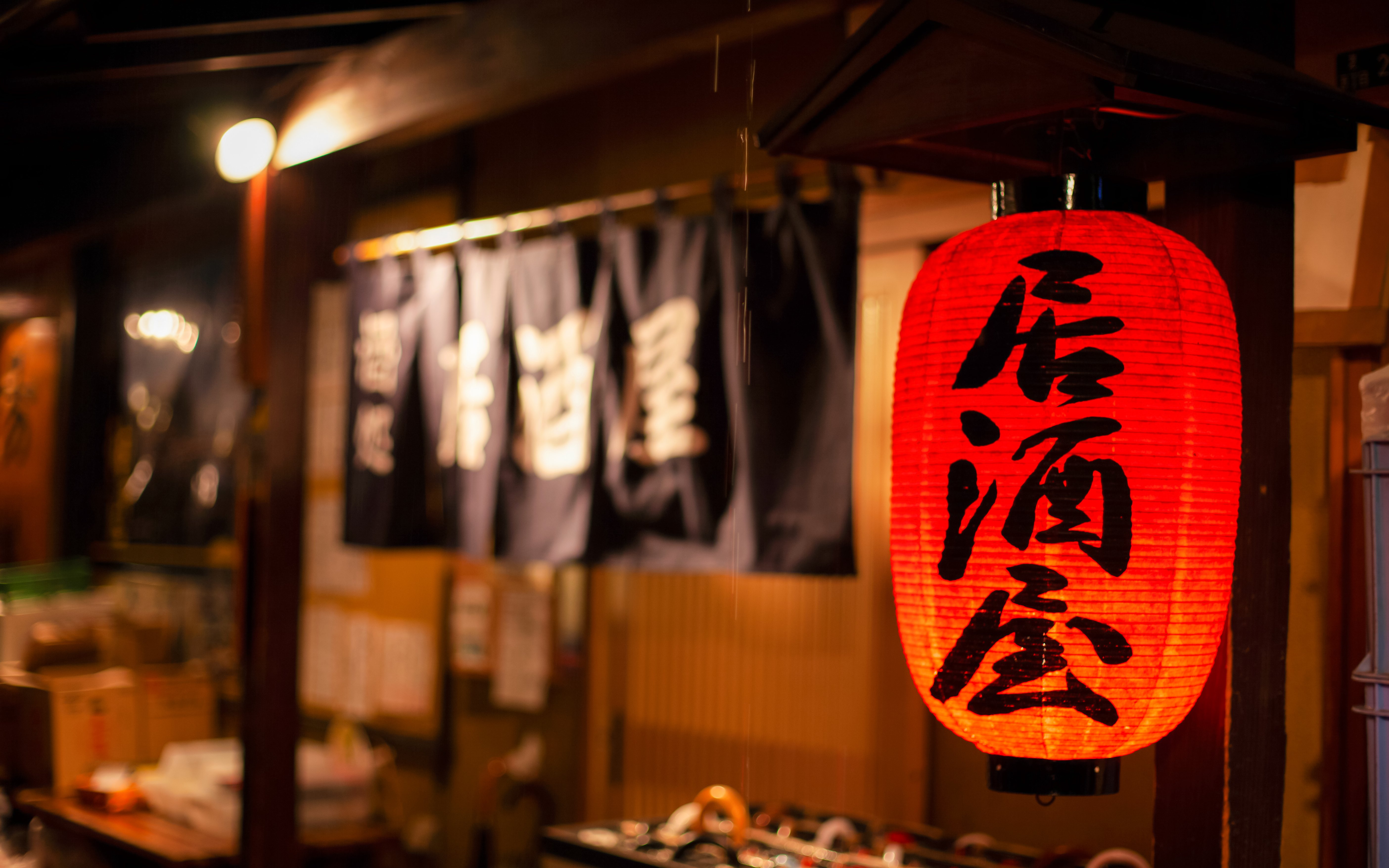 Red lantern outside a Shinjuku izakaya bar in Tokyo.