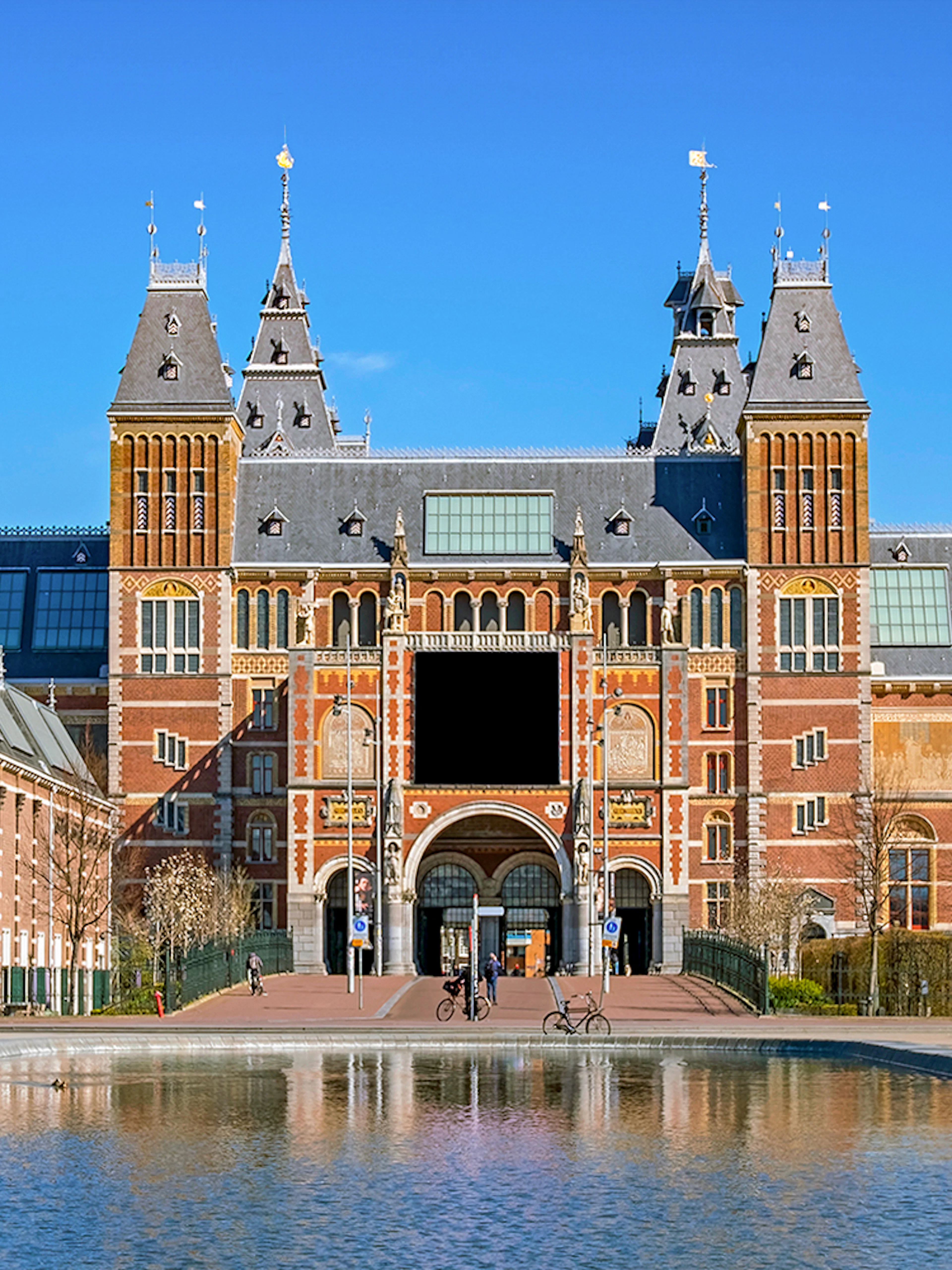 Rijksmuseum facade with visitors, Amsterdam, part of Skip The Line Combo tour.