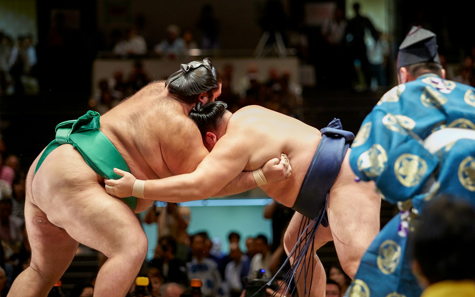 Sumo wrestlers competing at Sumo Tournament.