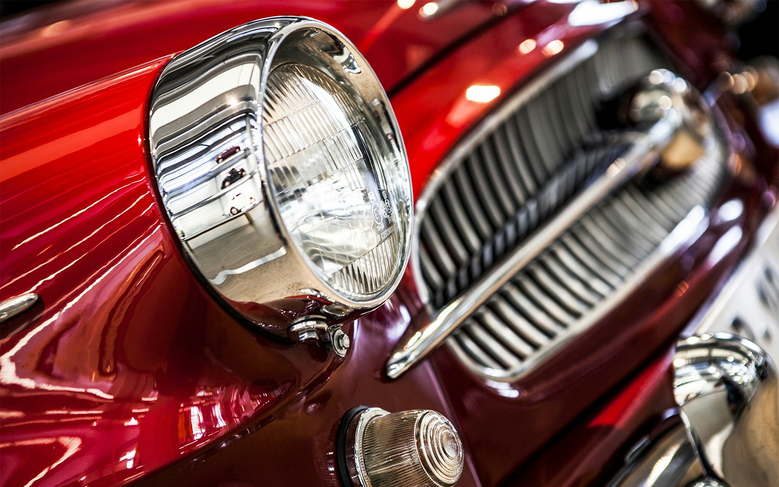 Classic car headlight and grille at Museum of Science and Technology, Milan.
