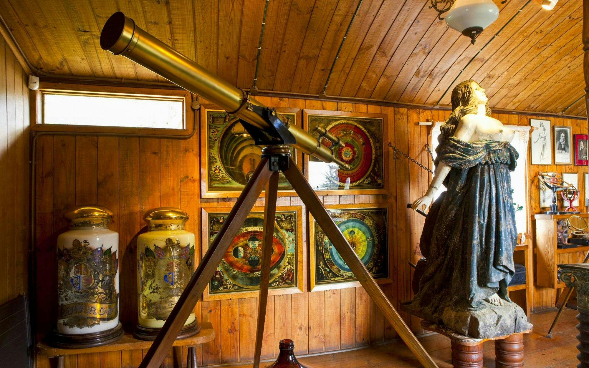Antique telescope and collectibles in Casa Museo Isla Negra, Pablo Neruda's former home in Chile.