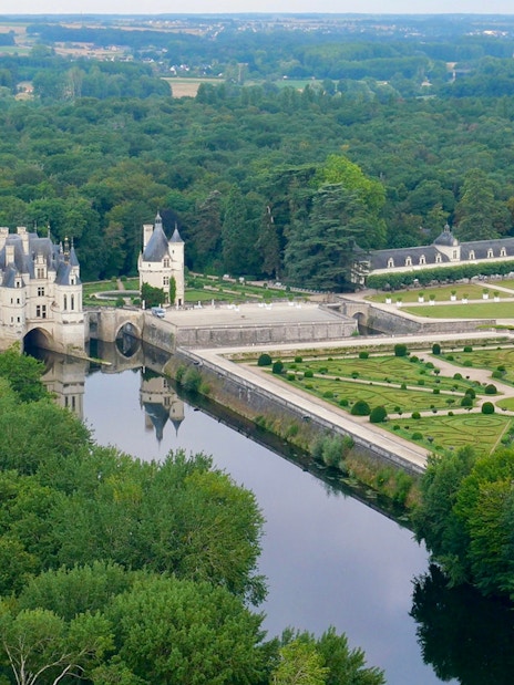Chenonceau Castle with gardens and river view, Loire Valley, France.