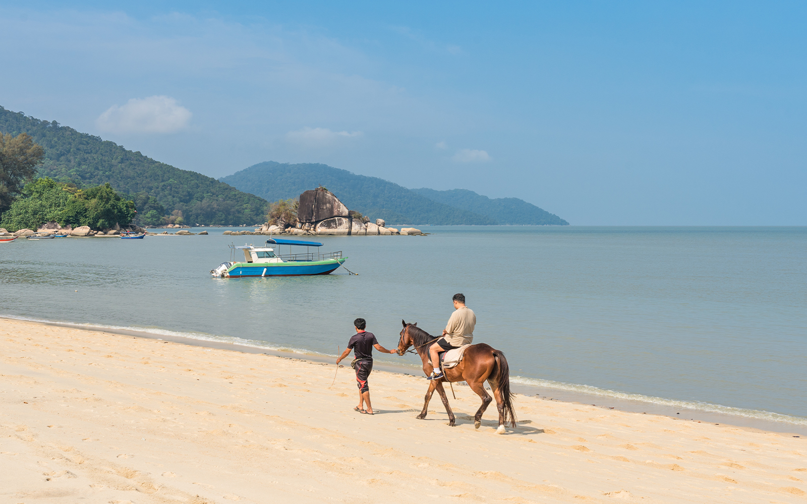 horse riding at Batu Ferringhi beach