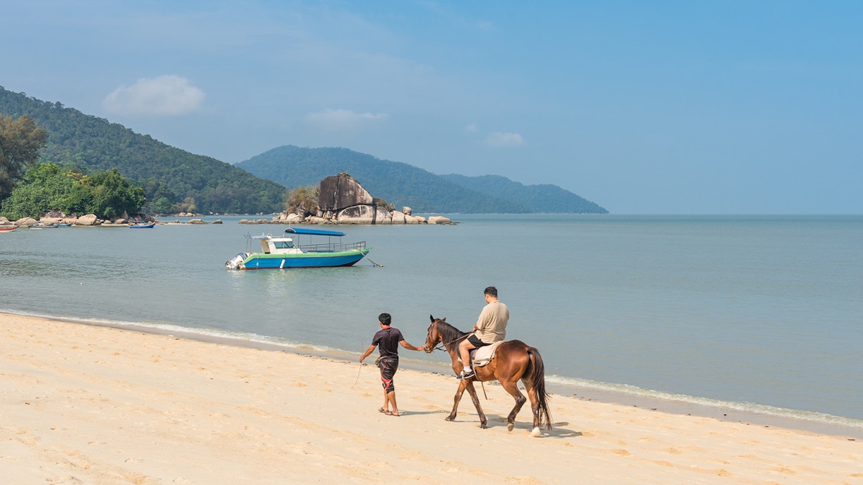 horse riding at Batu Ferringhi beach