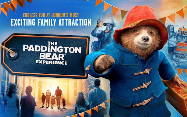 Paddington Bear statue at Paddington Station, London, promoting The Paddington Bear Experience.