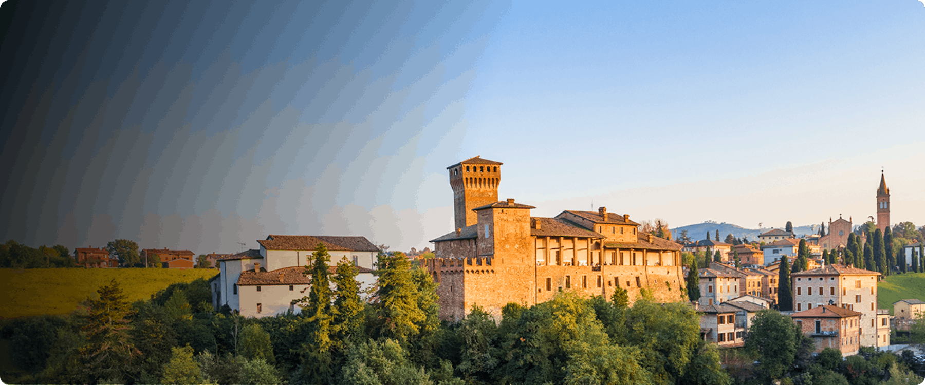 Historic castle and village landscape in Modena, Italy.