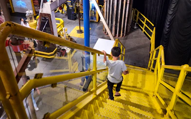 Child exploring interactive exhibit at Petrosains, The Discovery Centre in Kuala Lumpur.