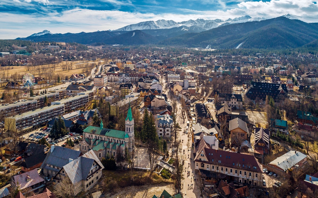 Aerial view of Zakopane with Tatra Mountains in the background, near Morskie Oko.
