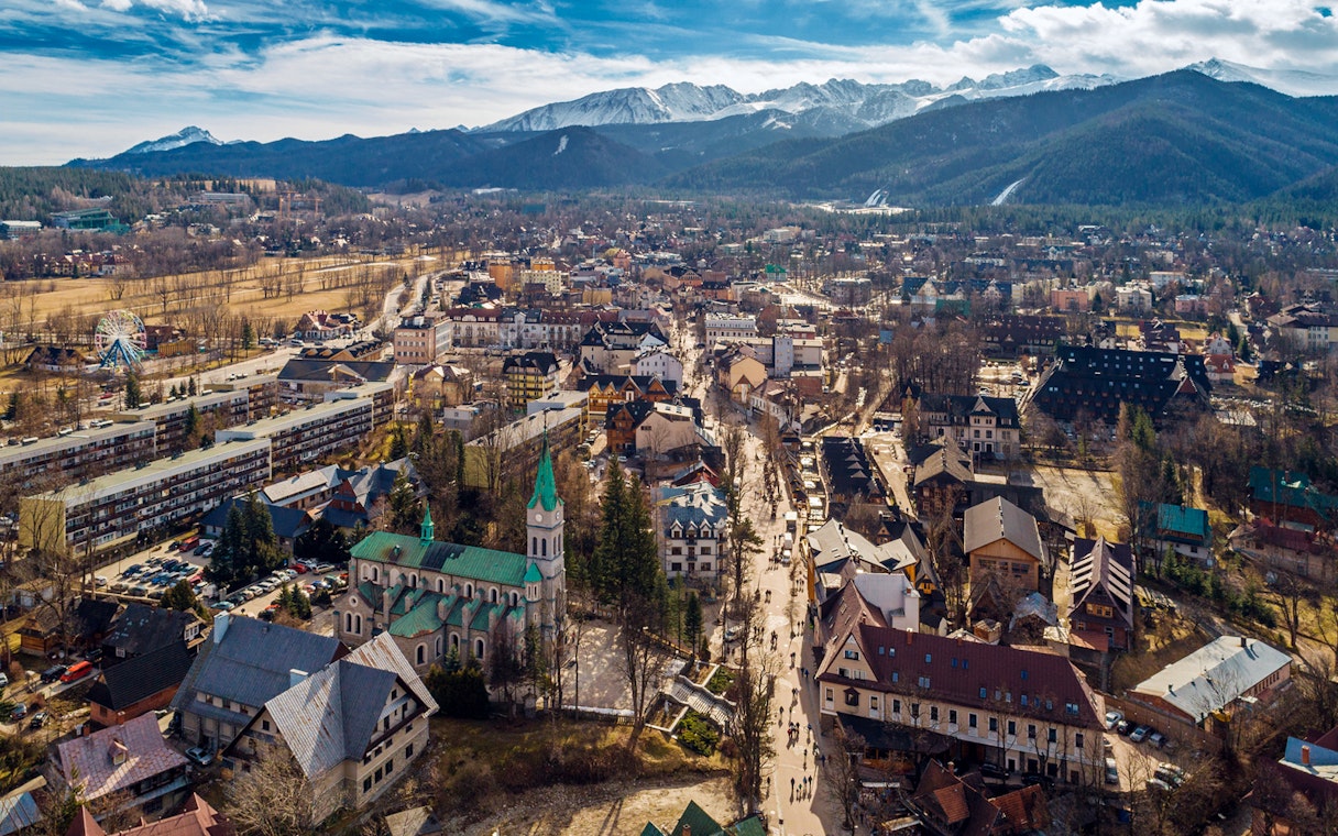 Aerial view of Zakopane with Tatra Mountains in the background, near Morskie Oko.