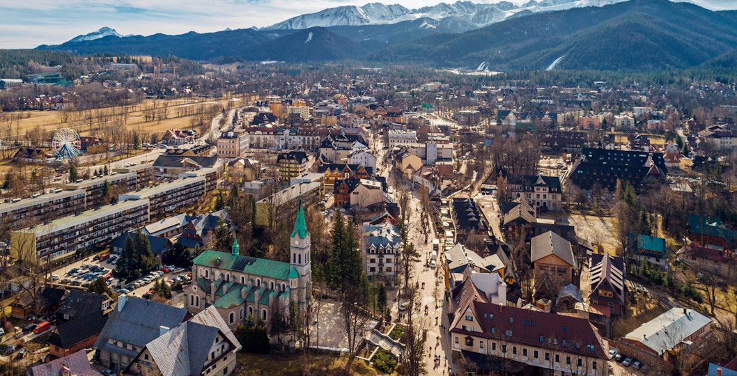 Aerial view of Zakopane with Tatra Mountains in the background, near Morskie Oko.
