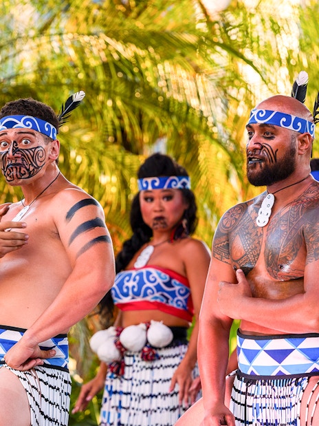Performers in traditional attire at Moana Luau, Hawaii.