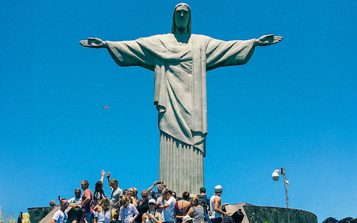 Visitors at Christ the Redeemer statue in Rio de Janeiro during peak season.