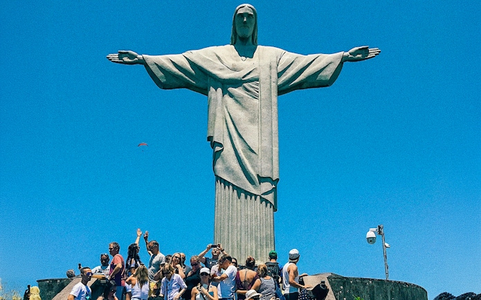 Visitors at Christ the Redeemer statue in Rio de Janeiro during peak season.