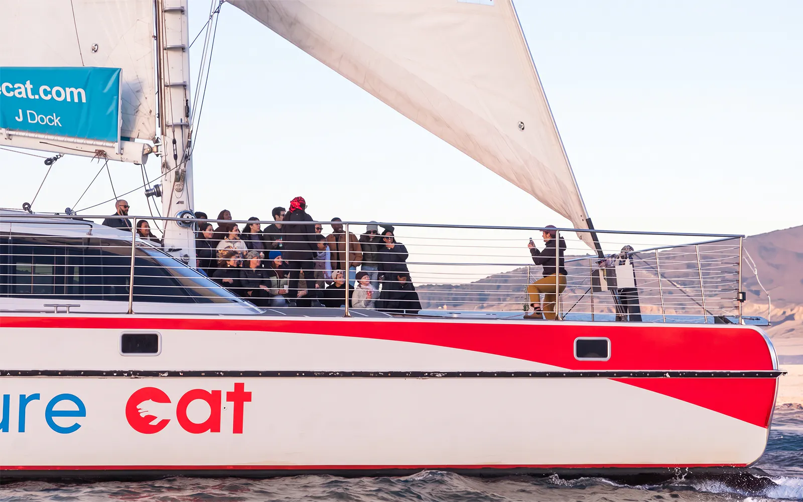Sailing catamaran with tourists on San Francisco Bay.