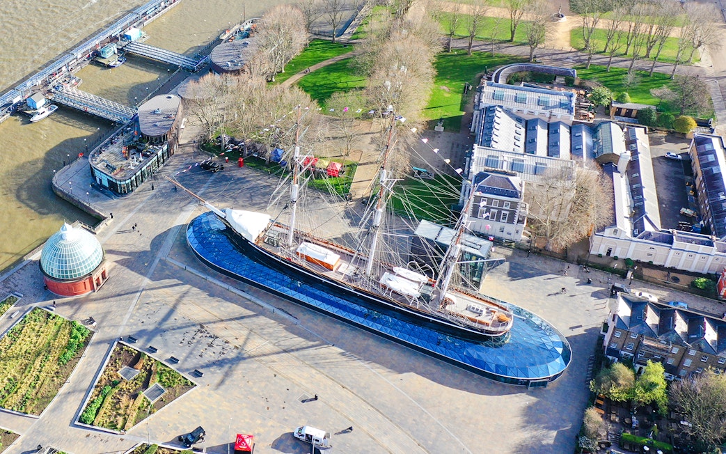 Aerial view of the Cutty Sark ship in Greenwich, London, near the Thames River.