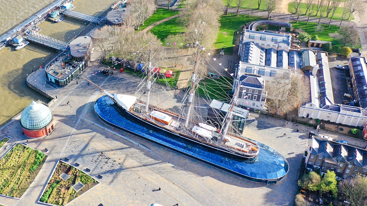 Aerial view of the Cutty Sark ship in Greenwich, London, near the Thames River.