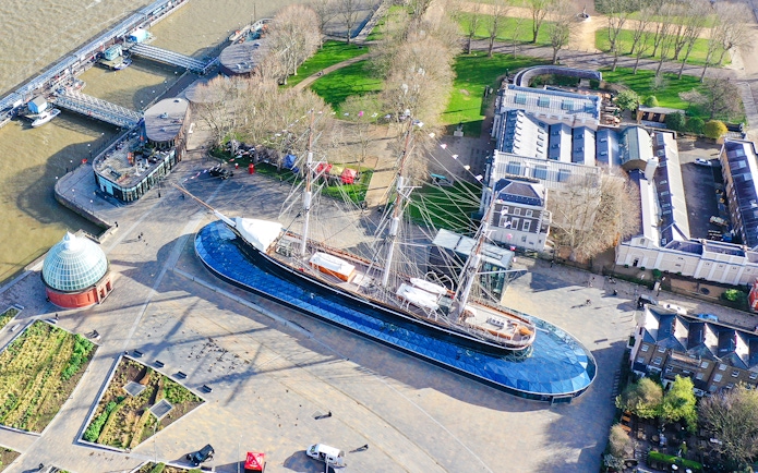 Aerial view of the Cutty Sark ship in Greenwich, London, near the Thames River.