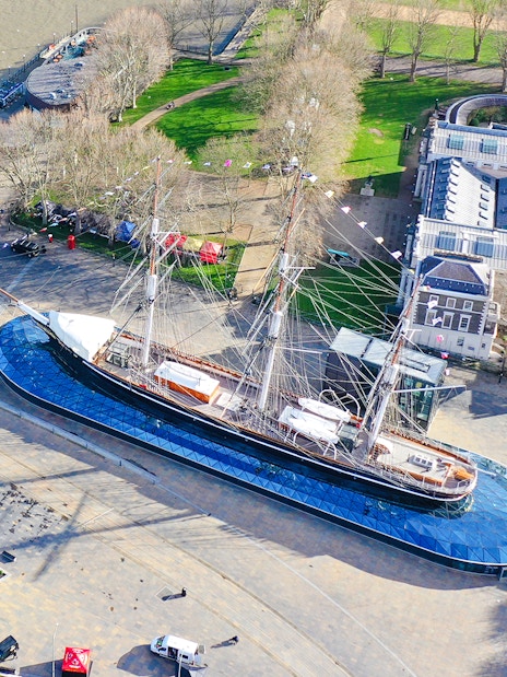 Aerial view of the Cutty Sark ship in Greenwich, London, near the Thames River.