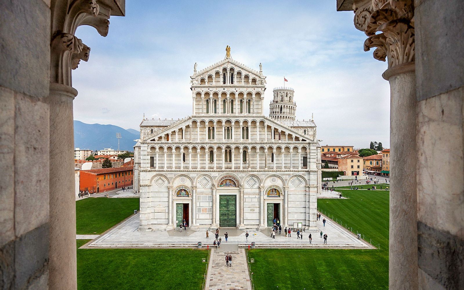 Leaning Tower of Pisa with Pisa Cathedral Duomo in the background, Italy.