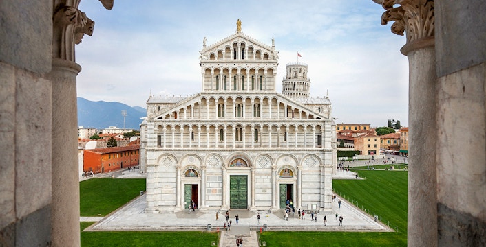 Leaning Tower of Pisa with Pisa Cathedral Duomo in the background, Italy.