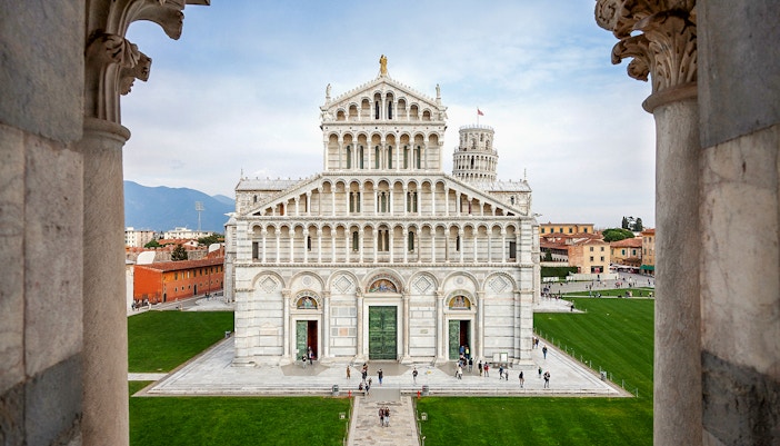 Leaning Tower of Pisa with Pisa Cathedral Duomo in the background, Italy.