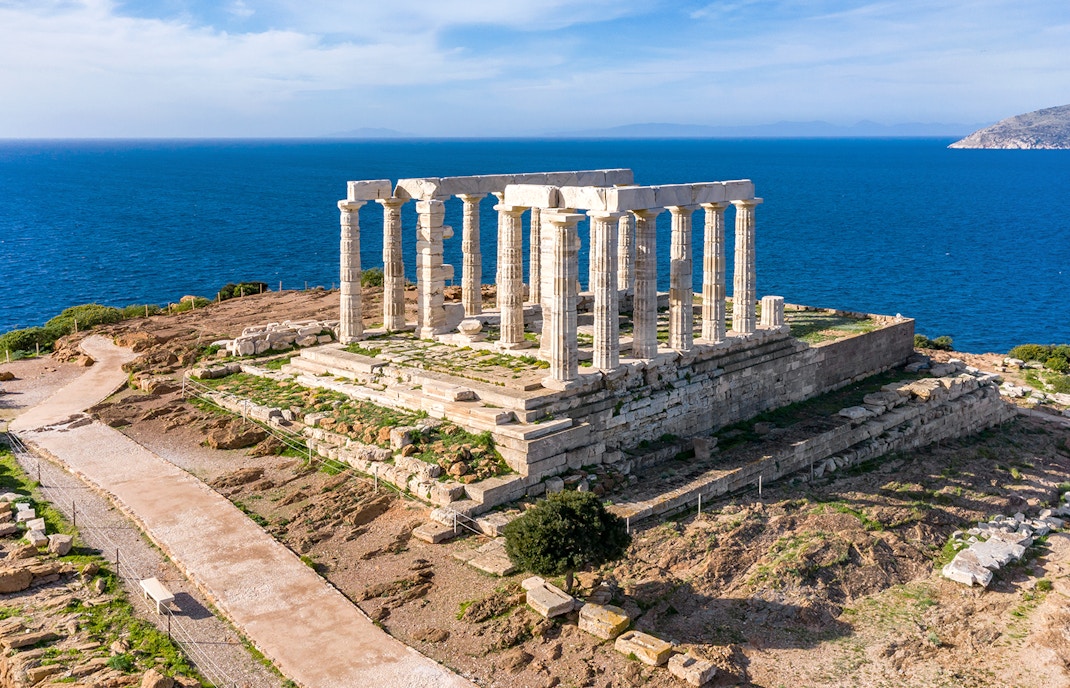 Temple of Poseidon at Cape Sounion with sea view in Athens, Greece.