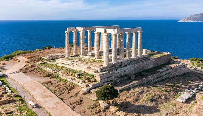 Temple of Poseidon at Cape Sounion with sea view in Athens, Greece.