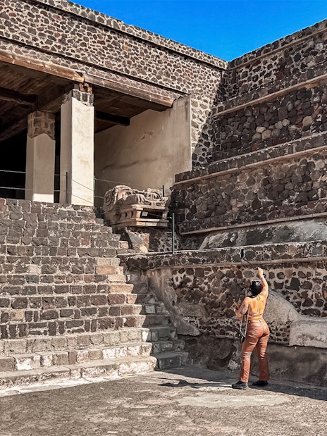 Entrance to the Palace of Quetzalpapalotl with stone walls and columns in Teotihuacan.